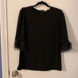 Michael Kors Top with feather sleeves. Size medium